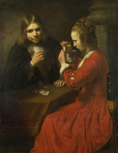 카드놀이를 하는 젊은 남자와 소녀